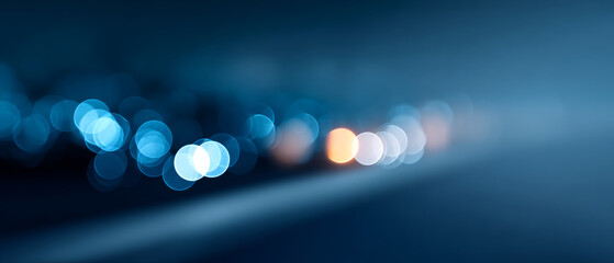 Abstract blue and orange bokeh lights with soft focus creating a dreamy and atmospheric background effect