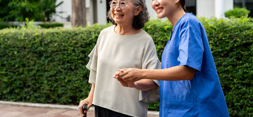 An elderly individual receives compassionate care from a healthcare professional in a cozy home setting. Their warm interaction highlights trust, support, importance of personalized medical attention