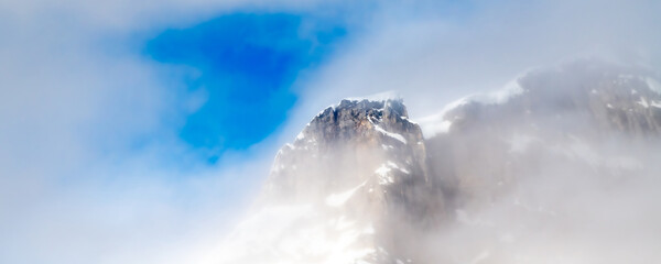 Winterlandscape  mountains with snow, ice and blue sky on spitsbergen Norway