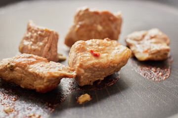 Close-up of stewed beef meat in a frying pan