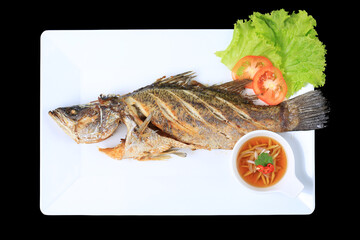 Deep-fried Seabass with Fish Sauce. Food photography for use in menus