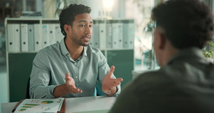 Manager, men and discussion in meeting at office, performance review and graphs for employee evaluation. Communication, talk and people at desk with chart for feedback, advice or supervisor critique