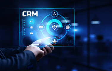 CRM Customer relationship management concept. Businessman pressing button on screen.