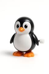 Fototapeta premium Penguin figurine toy isolated on white