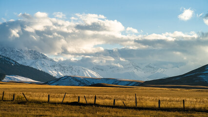 mountain peaks in the clouds. a beautiful mountain gorge. autumn in the mountains