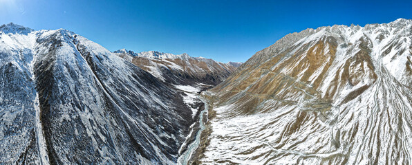 snow-capped mountain peaks. highlands, cliffs