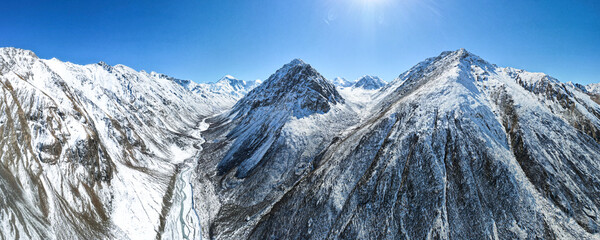 snow-capped mountain peaks. highlands, cliffs