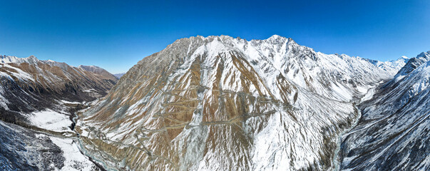 snow-capped mountain peaks. highlands, cliffs