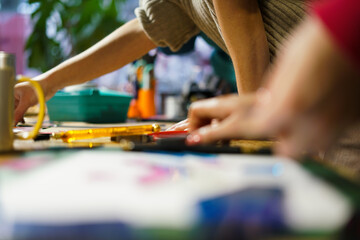 Making stained glass during artistic workshop. 