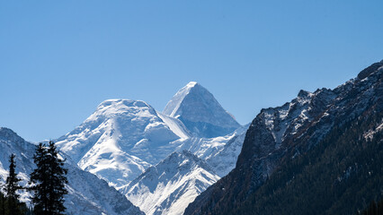snow-capped mountain peaks. highlands, cliffs