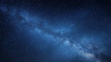 Wide celestial panorama featuring a blue night sky, galaxy dust, and distant stars