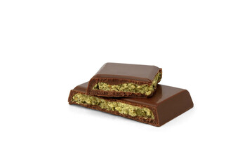 Pieces of Dubai chocolate bar with with pistachio isolated on white background.