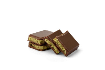 Pile of Dubai chocolate bar with with pistachio isolated on white background.