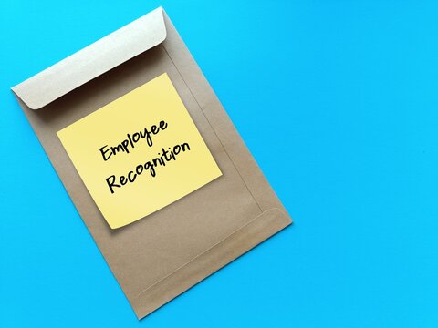 Office envelope on blue background written Employee Recognition - act of acknowledging rewarding employees for contributions effort and achievements to show they are valued