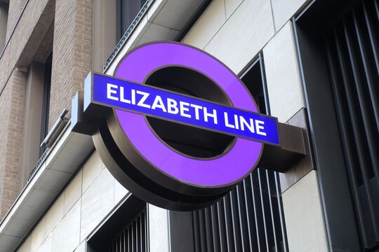 Purple sign for the Elizabeth Line at a London Underground tube station