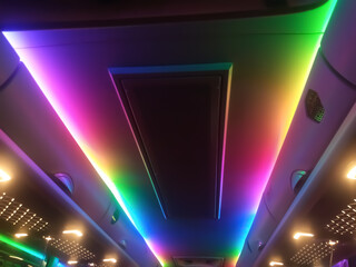 Prismatic symmetrical light patterns and a spectrum of colors create a futuristic, shimmering tunnel. Intense rainbow light creates the illusion of infinite space and energy.