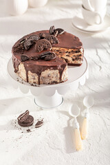 Tasty cheesecake served on white wooden table.