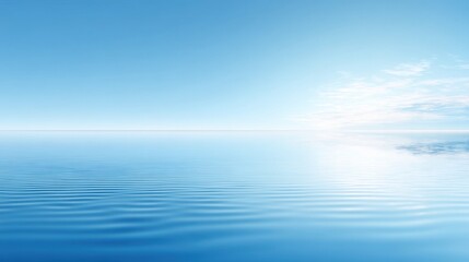 Obraz premium Serene Wide-Angle View of Calm Blue Ocean Water with Gentle Ripples and Clear Sky at Dawn or Dusk, Ideal for Tranquil Backgrounds and Nature Themes