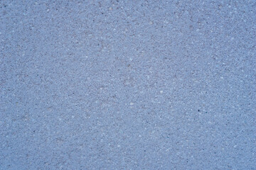 Fototapeta premium light pale blue fine-grained sand or concrete surface texture, detailed uniform construction background, concept of building material, architecture, minimalist design