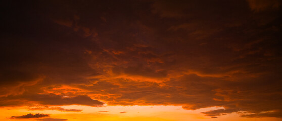 Awesome sunset and soft pink clouds of pastel tones. Image template of textured sky. Gorgeous photo wallpaper. Bright epic sky. Dramatic evening light and fiery orange sunset. Beauty of earth.