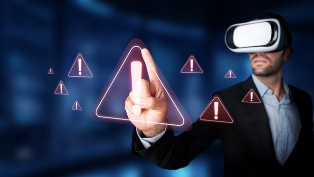 A man engages with virtual reality technology, using hand gestures to interact with warning alerts in a digital environment, showcasing innovation and technology trends. Raster