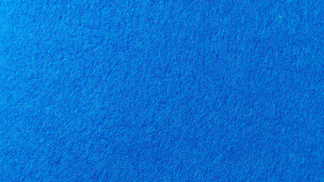 Rich Royal Blue Felt Fabric Texture Macro Background with Fine Fiber Detail