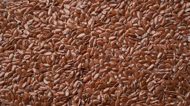 Sesame seeds flatlay macro loop seamless food background