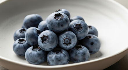 Vibrant fresh blueberries, organic berries, healthy snack, nutritious fruit, antioxidant-rich superfood, juicy berries, natural ingredients, colorful food, dietary supplement, farm fresh produce