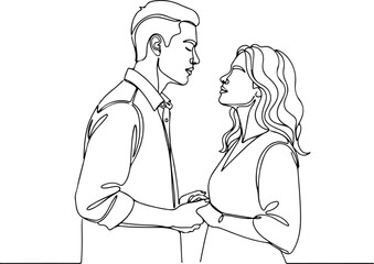 Couple in love holding hands and looking at each other with affection.