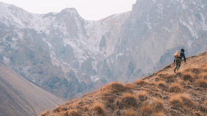 Concept Of The achievement of success - Hiker in the Mountain