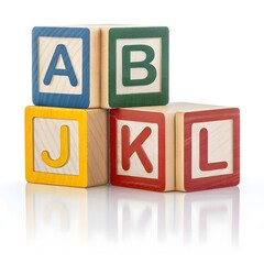 Colorful wooden alphabet blocks stacked on a white surface isolated on white background, educational toy