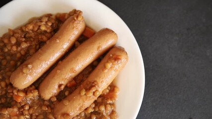 Lentils with sausage second course meal tasty appetizer fresh gourmet food background on the table rustic top view copy space