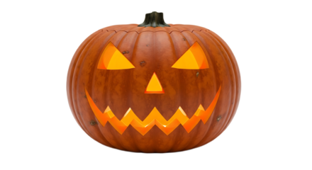 A lit jack o lantern with triangular eyes and a jagged mouth against a black background for halloween