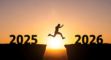The silhouette of a person leaping from 2025 to 2026 against a vibrant sunset creates a striking visual metaphor for ambition, transition, and the anticipation of a new year's potential against a