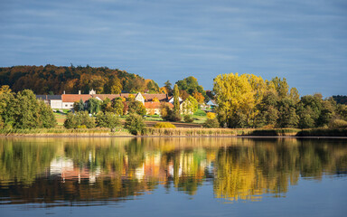 reflection of the village of geras in a lake