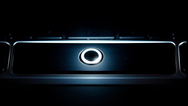 Close up view laptop power button illuminated but screen completely black isolated dark background symbolizing boot failure system crash hardware malfunction display issue repair diagnostic concept te