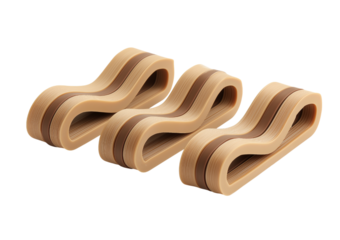Three brown and tan rubber strips isolated on a transparent background