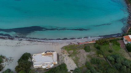 Fototapeta premium Aerial coastal view of Sotto Torre beach with turquoise water in Calasetta
