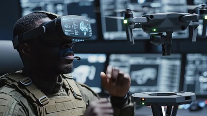 African american man in vr headset interacts with virtual drone and floating drone in military control room, future technology - Powered by Adobe