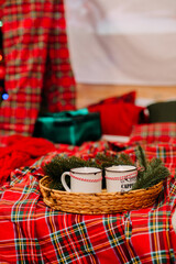 Cozy Christmas Setting with Hot Cocoa and Marshmallows on Festive Bed