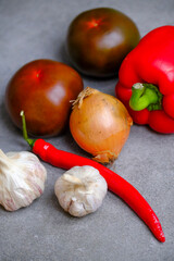 Fresh vegetables. peppers, tomatoes, onions and garlic
