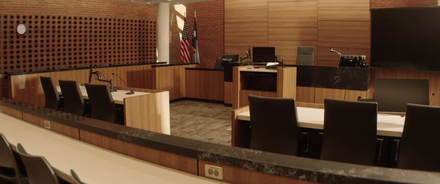 Part of a series of shots inside an empty United States public courtroom. Themes of justice, trial, crime and law. Filmed with anamorphic lenses in 2.39:1 scope ratio.
