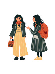 two girls talking and laughing together in cheerful scene