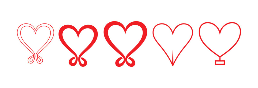 Red ribbon isolated on white background with a romantic heart symbol for Valentine's Day couple celebration