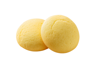 Two round yellow cookies isolated on a transparent background