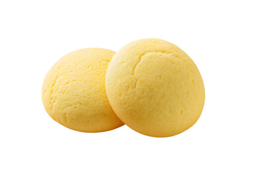 Two round yellow cookies isolated on a transparent background