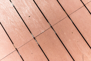 Wooden deck planks installation outdoor scene home improvement natural environment close-up view