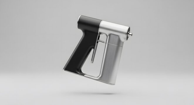 A black and silver staple gun isolated on white background stands upright