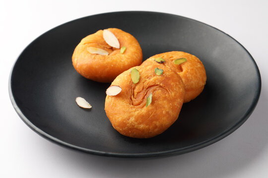 Balushahi, a traditional Indian dessert. This sweet is popular in North India, Odisha, and Bihar, and a similar pastry known as Badusha is found in South India. 