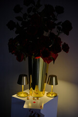 Banquet ceremony - playing cards arrangement with red roses and dice